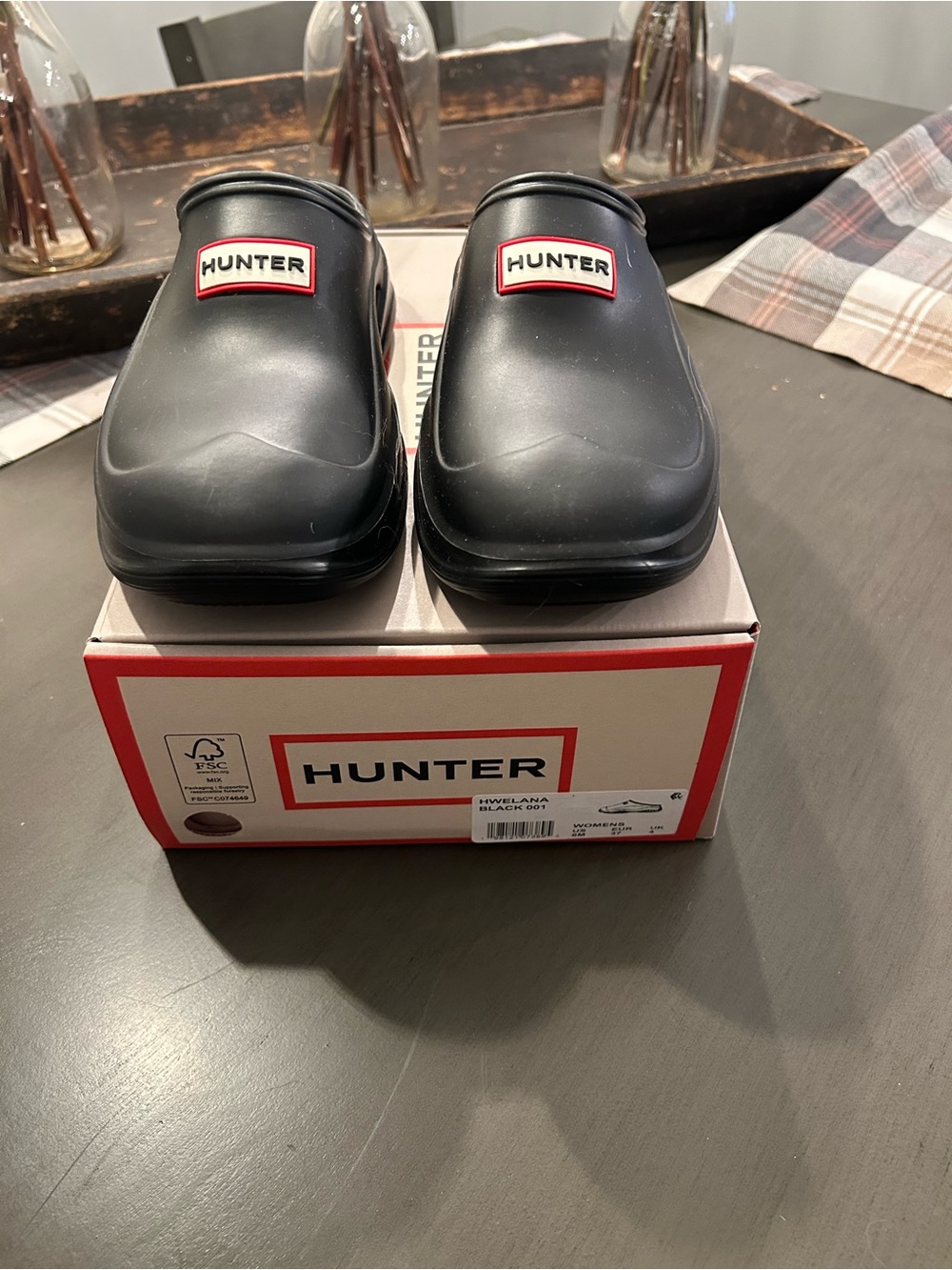 Hunter Black Waterproof Slip-On Clogs with Red Logo
